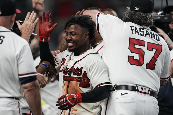 Ozzie Albies' mammoth homer sends Braves past Reds in 11th inning