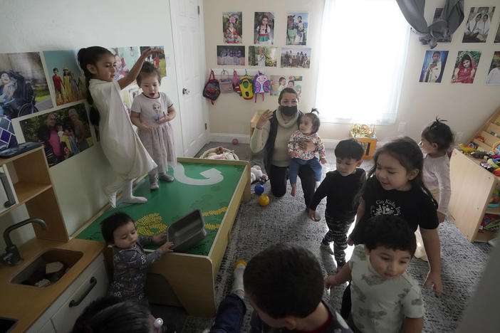 Patricia Moran watches as children play at her child care facility in San Jose, Calif.