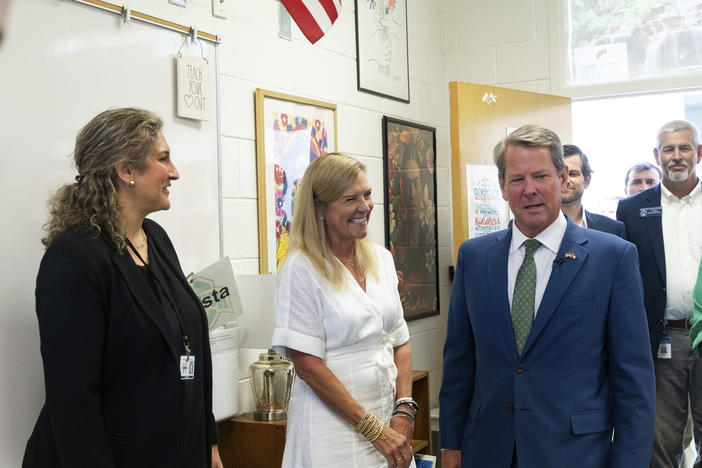 Georgia Gov. Brian Kemp and Georgia first lady Marty Kemp meet with Dorcas Acosta, a Spanish teacher at Ola High School, July 29, 2022, in McDonough, Ga. On on Sunday, June 11, 2023, Kemp, a Republican, was elected to lead the 16-state Southern Regional Education Board. 