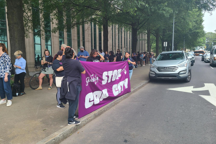 Protesters gathered, lined up and created banners in front of Atlanta City Hall on June 5, 2023 as Atlanta City Council holds a period of public comment and votes on funding for the proposed police training facility.