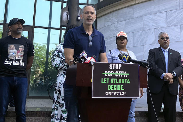 Community organizer Kamau Franklin speaks during a news conference outside Atlanta's City Hall, Wednesday, June 7, 2023, to announce an effort to force a referendum that would allow Atlanta voters to decide whether the construction of a proposed police and firefighter training center should proceed.