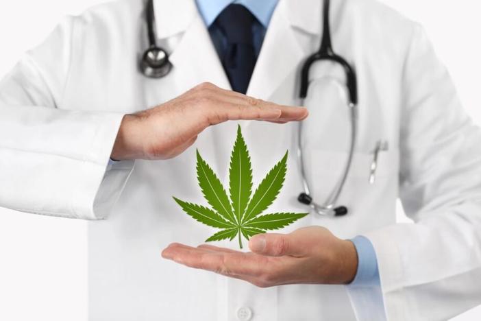 cannabis leaf and doctor
