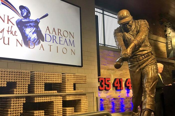 A statue of Hank Aaron inside Truist Park in metro Atlanta. The Atlanta Braves celebrate Hank Aaron Week each summer to honor the baseball legend.