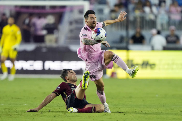 Atlanta United midfielder Santiago Sosa (5) defends against Inter Miami forward Lionel Messi (10) during the first half of a Leagues Cup soccer match, Tuesday, July 25, 2023, in Fort Lauderdale, Fla.