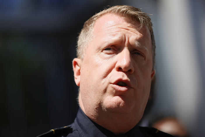 Atlanta Police Chief Darin Schierbaum speaks to reporters near the scene of a shooting, May 3, 2023, in Atlanta. Schierbaum said Wednesday, July 5, a fire that destroyed eight Atlanta Police Department motorcycles was among several acts of vandalism in recent days by a group of "anarchists” aimed at stopping construction of a new public safety training center. (AP Photo/Alex Slitz, File)