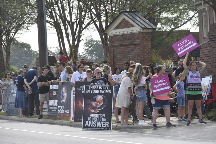  Anti-abortion protesters gather outside A Preferred Women’s Health Center of Atlanta in Forest Park. 