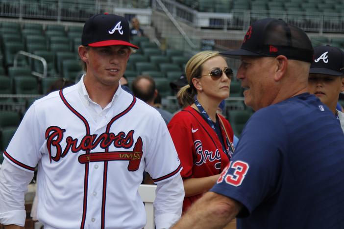 Hurston Waldrep (left) meets Braves manager Brian Snitker, July 15, 2023.