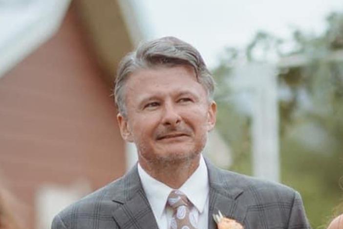 Jason Crawford is shown in a suit and tie for this posed photo.