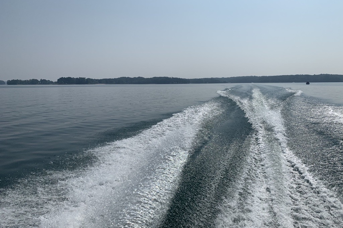 A boat's wake on Lake Lanier, June 29, 2023. The Georgia Department of Natural Resources calls the Fourth of July holiday weekend the busiest boating weekend of the year. The heat will likely increase those numbers, making it more dangerous as people head to the water to cool off. Credit Devon Zwald.