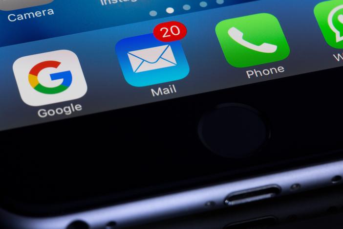 iPhone screen with email notifications showing