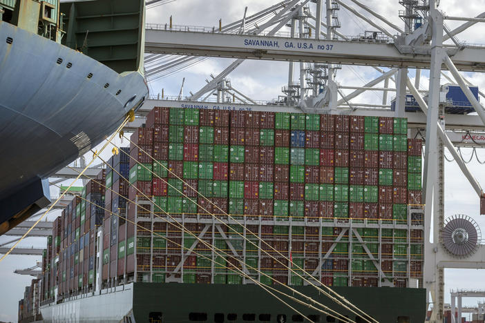 In this photo provided by the Georgia Ports Authority, a vessel is loaded with containers by a ship to shore crane at the Georgia Ports Authority's Port of Savannah Garden City Terminal, on Oct. 21, 2021, in Savannah, Ga.