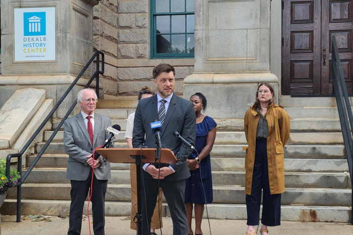Attorney Jeff Filipovits joins four DeKalb residents at the DeKalb Courthouse June 10, 2023 to announce they filed a lawsuit against the city of Atlanta.