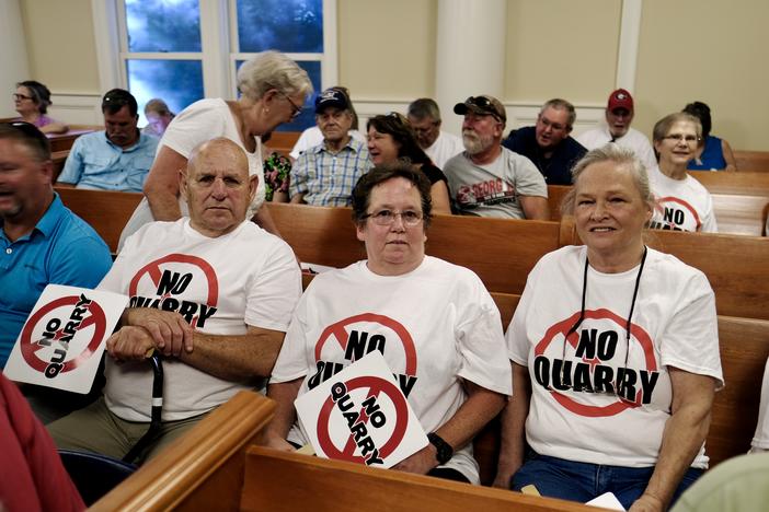 People protesting proposed rock quarry