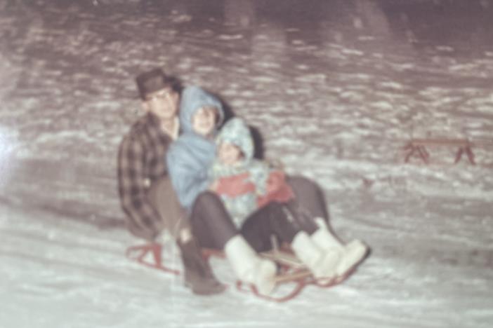 Sharon Collins, 10 - in the center - with her father and sister. "Dad never said 'no' to snow."