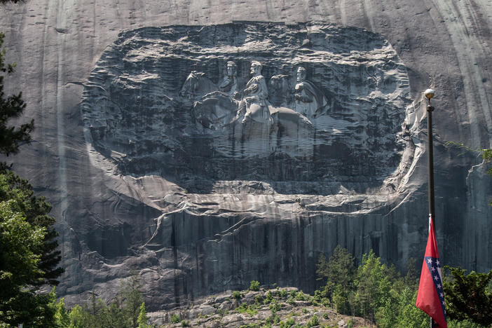 A carving on Stone Mountain honoring Confederate generals is shown on Monday, May 24, 2021, in Stone Mountain, Ga. Civil rights groups are blasting a concert series with Black performers dubbed “Soul Fest” at a Georgia park with a giant carving of Confederate leaders. Stone Mountain Park just outside Atlanta is where the Ku Klux Klan marked its rebirth in 1915.