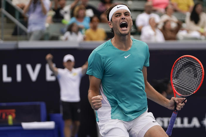 Taylor Fritz reacts after winning in sudden death against Gael Monfils to advance to the Ultimate Tennis Showdown finals, Sunday, July 23, 2023, in Carson, Calif. 