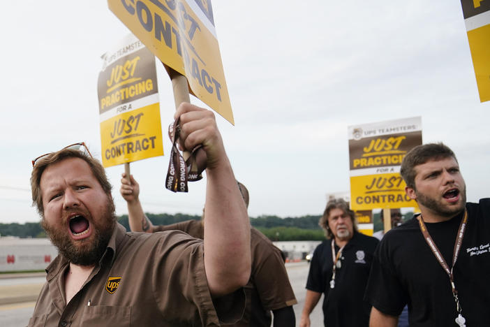 UPS teamsters and workers hold a rally, Friday, July 21, 2023, in Atlanta, as a national strike deadline nears. The Teamsters said Friday that they will resume contract negotiations with UPS, marking an end to a stalemate that began two weeks ago when both sides walked away from talks while blaming each other. 