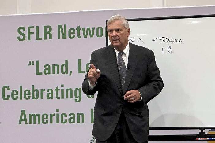 U.S. Agriculture Secretary Tom Vilsack speaks to a conference of Black forestland owners in Brunswick, Ga., on Tuesday, Aug. 22, 2023. Vilsack announced a new Biden administration program that will spend $150 million to help owners of small parcels of forestland partner with companies willing to pay them for carbon offsets and other environmental credits. 