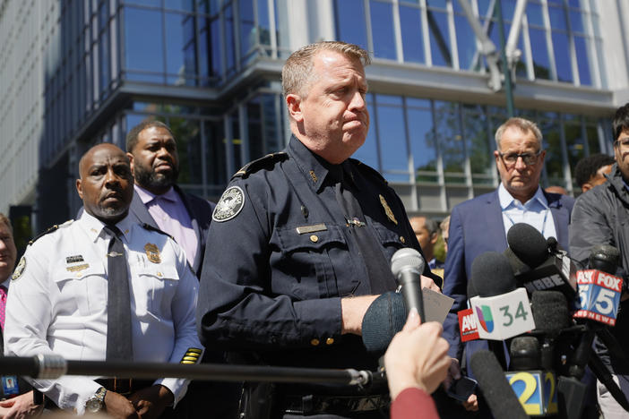 Atlanta Police Chief Darin Schierbaum speaks to reporters near the scene of a shooting on May 3, 2023 in Atlanta. Schierbaum on Tuesday, Aug. 1, urged the public to come forward with information about those who set police motorcycles on fire last month in protest over the planned construction of a public safety training center that critics call “Cop City.” 