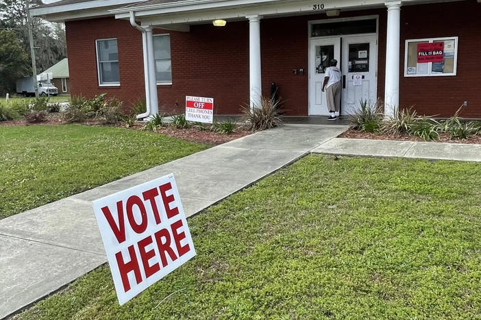 A voter enters the polling place at Woodbine City Hall during the March 8, 2022, referendum on the county land purchase for Spaceport Camden.