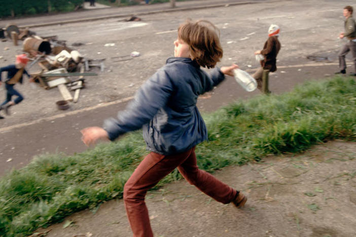 Anne Marie, aged 10, throwing bottles at British troops during a riot in Belfast, Northern Ireland, in 1981.
