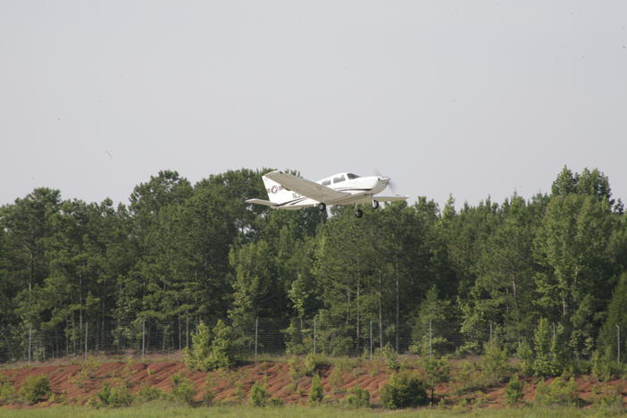 A Cessna Skyhawk flies over LaGrange Callaway Airport during LaGrange College's Aviation Day event on July 19, 2023. Credit: LaGrange College