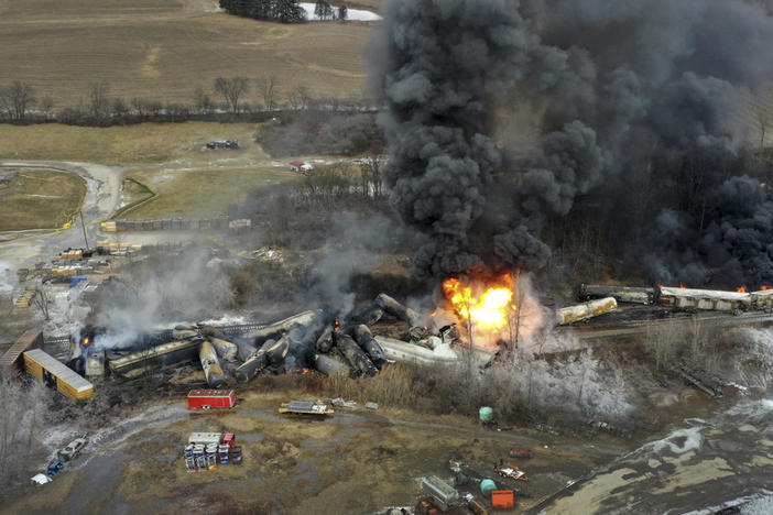 This photo taken with a drone shows portions of a Norfolk and Southern freight train that derailed Friday night in East Palestine, Ohio are still on fire at mid-day Saturday, Feb. 4, 2023. 