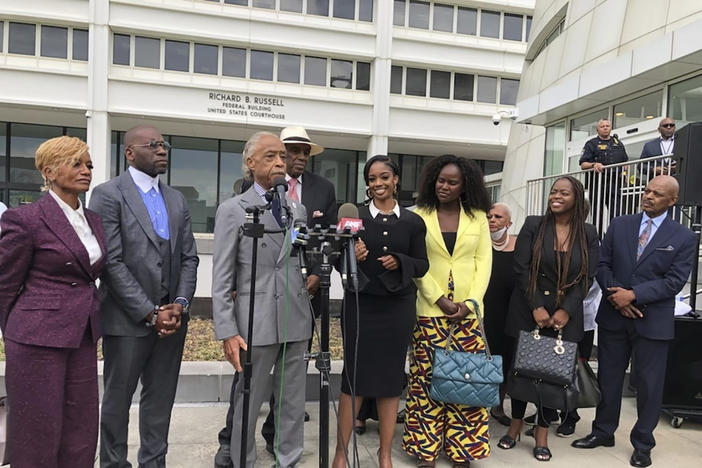 The Rev. Al Sharpton speaks outside the Richard B. Russell federal courthouse in Atlanta, on Tuesday, Sept. 26, 2023. To his left in the black dress is Fearless Fund CEO and co-founder Arian Simone. A judge Tuesday refused to block a grant program the fund administers for Black women entrepreneurs, saying a lawsuit arguing it illegally excluded other races was not likely to succeed. 