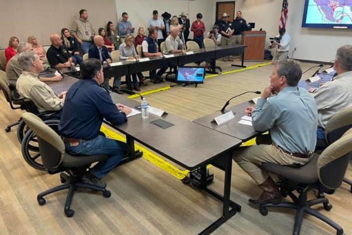 Gov. Brian Kemp (right foreground) attended a briefing on illegal immigration at the Texas border in 2021.