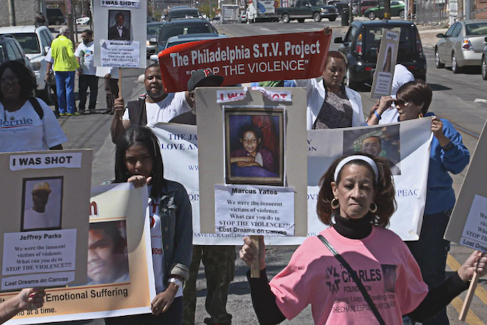 A group of people marching against gun violence.