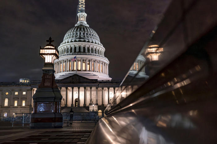 The Capitol is seen late Tuesday night, Sept. 26, 2023, in Washington, as lawmakers work to advance appropriations bills on the House floor. The Republican-controlled House and the Democrat-controlled Senate are starkly divided over very different paths to preventing a federal shutdown.