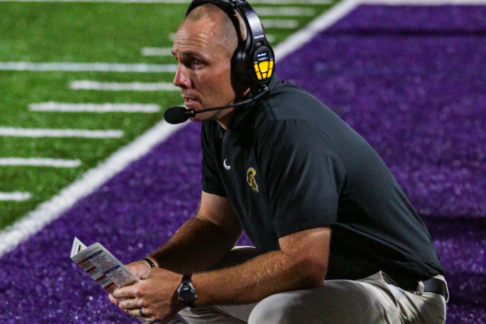 Carrollton head coach Joey King coaching during their game against East Coweta.