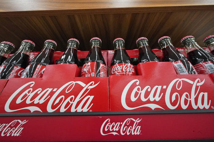 Bottles of Coca-Cola are on display at a grocery market in Uniontown, Pa, on Sunday, April 24, 2022. Coca-Cola reports earnings on Tuesday, Oct. 24, 2023.
