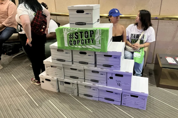 On Sept. 11, Stop Cop City activists submitted boxes containing what they say is more than 116,000 signed petitions in support of a public vote on the Atlanta Public Safety Training Center to the city clerk. 