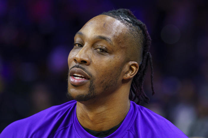 Los Angeles Lakers' Dwight Howard looks on prior to an NBA basketball game, Jan. 27, 2022, in Philadelphia. In a response to a state civil suit filed this week by his attorney, Howard has denied accusations by a Georgia man who says he was sexually assaulted by the former NBA star and another person. 