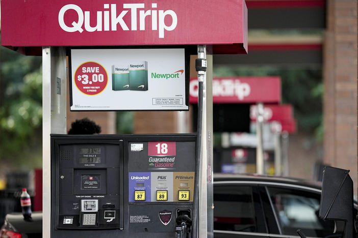 A person pumps gas on Sept. 12, 2023, in Marietta, Ga. Georgia's governor Brian Kemp on Friday, Oct. 6, 2023, continued his rollback of state taxes on gasoline and diesel fuel through Nov. 11, 2023. 