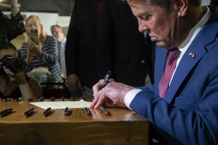 Gov. Brian Kemp signs a law