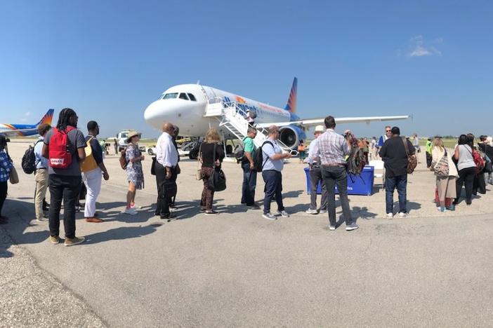 The 2023 Ocmulgee to Okmulgee Tour traveled on a chartered jet from Middle Georgia Regional Airport to Tulsa, Oklahoma. (Liz Fabian)