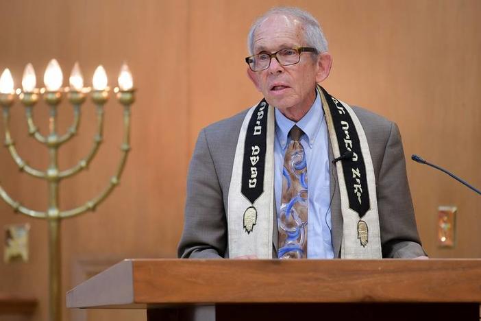 Rabbi Lawrence Schlesinger of Temple Israel conducts Shabbat services on Friday, October 6, 2023. 