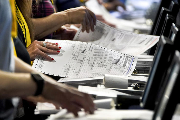 Election workers at the Allegheny County Election Division warehouse in Pittsburgh process ballots from the 2022 Pennsylvania primary on June 1, 2022. Threatening letters sent to local election offices in at least five states, some including fentanyl, are the latest concern for local election workers around the country, who have faced harassment and even death threats since the 2020 presidential election. 