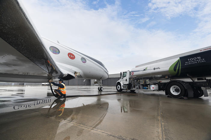 A Gulfstream G600 jet is fueled prior to departure for a historic test flight Sunday from Savannah to England using sustainable aviation fuel.