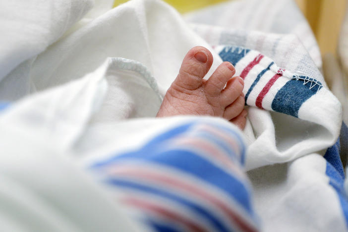 The toes of a baby peek out of a blanket at a hospital in McAllen, Texas. On Wednesday, Nov. 1, 2023, the Centers for Disease Control and Prevention reported the increase of U.S. infant mortality rate to 3% in 2022 — a rare increase in a death statistic that has been generally been falling for decades. 