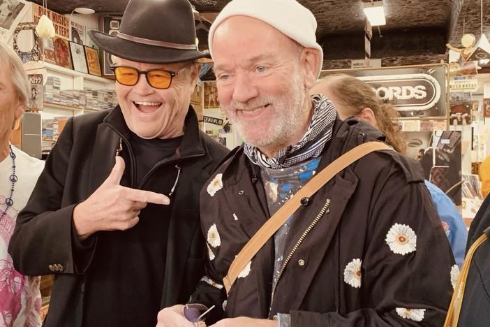 Micky Dolenz and Michael Stipe joke inside inside Wuxtry Records on Nov. 3, 2023. Dolenz was in town to promote is new EP, Micky Dolenz Sings R.E.M.