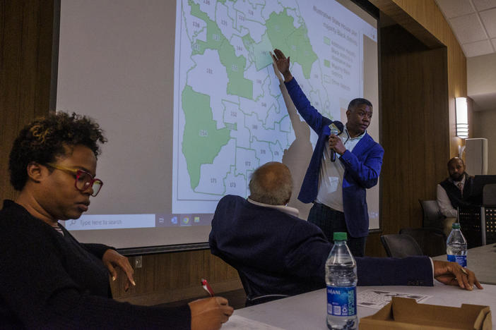 From left, Fenika Miller of Black Voters Matter, State Senator David Lucas, State House Representative James Beverly and Macon-Bibb County Commission member Virgil Watkins, Jr. during a community meeting on Georgia's special session for legislative redistricting Monday night in Macon.