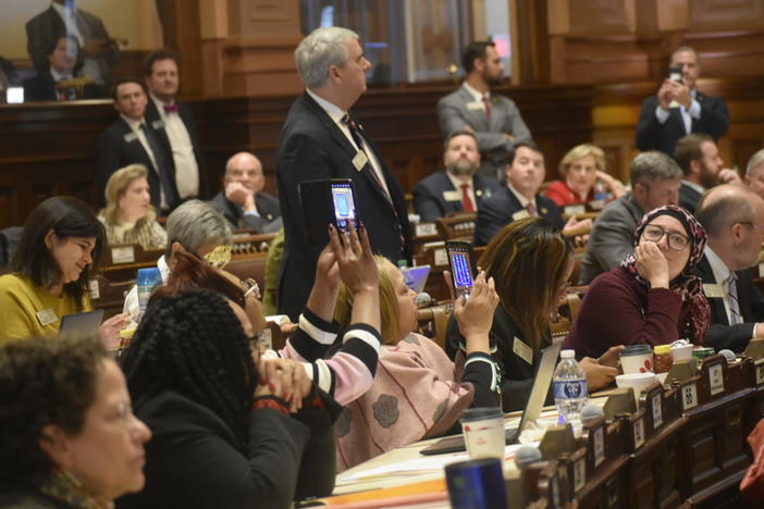  Lawmakers watch the votes comes in as a new congressional map cleared the House Thursday with a party-line vote. Ross Williams/Georgia Recorder