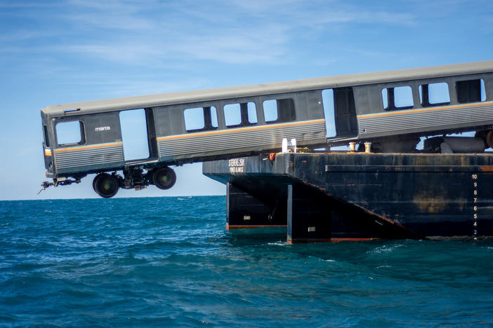 Concrete materials and retired MARTA railcars are placed at Artificial Reef L about 23 nautical miles east of Ossabaw Island on Thursday, Dec. 21, 2023.