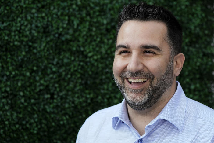 Atlanta Braves general manager Alex Anthopoulos talks with reporters during Major League Baseball's general manager meetings, Wednesday, Nov. 10, 2021, in Carlsbad, Calif. The Atlanta Braves have agreed to a contract extension with general manager Alex Anthopoulos that will keep him with the six-time reigning NL East champions through the 2031 season. The team announced the deal Friday, Jan. 12, 2024.