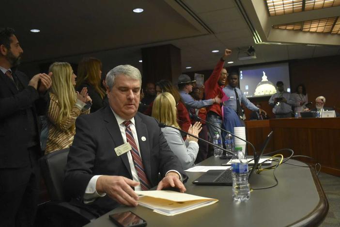 A demonstrator shouts “Free Palestine” after the passage of Rep. John Carson’s antisemitism bill. 