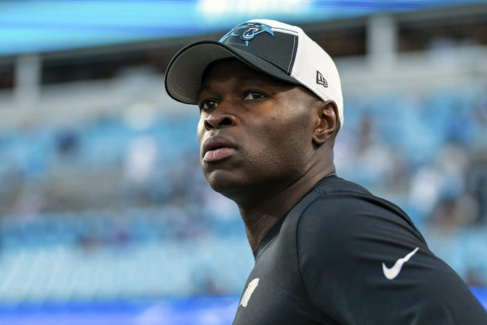 Carolina Panthers defensive coordinator Ejiro Evero looks on before an NFL football game against the New Orleans Saints Monday, Sept. 18, 2023, in Charlotte, N.C. Evero met again with the Atlanta Falcons to discuss their head coaching vacancy, Wednesday, Jan. 24, 2024, joining Rams assistant Raheem Morris and former Patriots coach Bill Belichick in receiving second interviews.