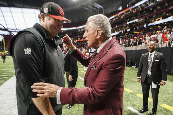 Atlanta Falcons head coach Arthur Smith speaks with Owner Arthur Blank after an NFL football game between the Atlanta Falcons and the Indianapolis Colts, Sunday, Dec. 24, 2023, in Atlanta. The Atlanta Falcons won 29-10.